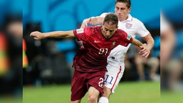 Varela, Ronaldo make last minute magic to keep Portugal's World Cup alive