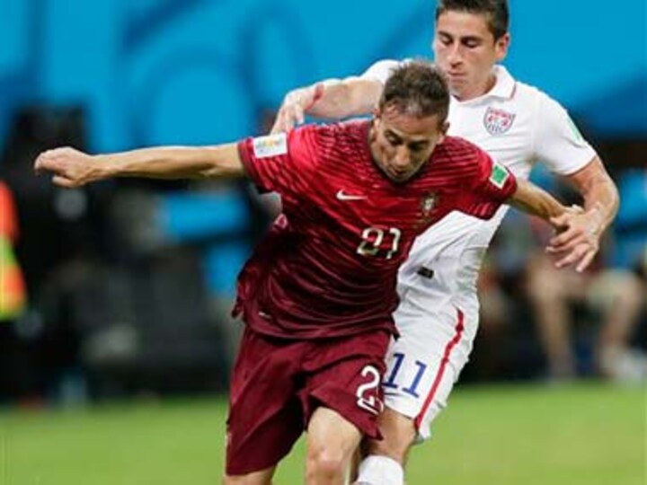 Varela, Ronaldo make last minute magic to keep Portugal's World Cup alive