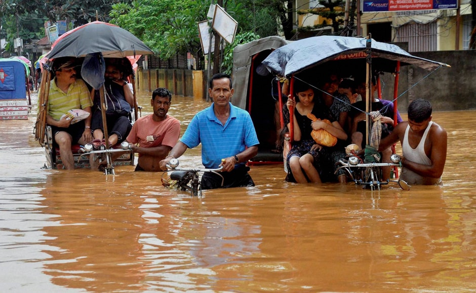 Photos: Citizens turn to boats as Guwahati floods after heavy rainfall ...