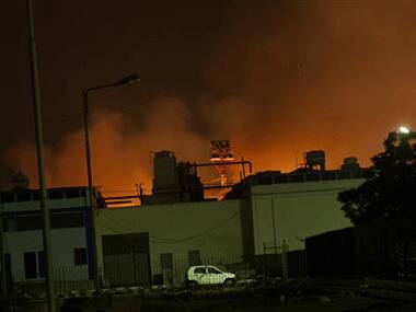 The nightsky over Karachi is illuminated by gunfire and explosions from the airport attack: AP