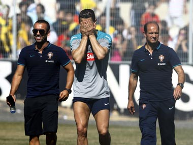 Portugal sweats as Ronaldo cuts short training session Portugal sweats as Ronaldo cuts short training session