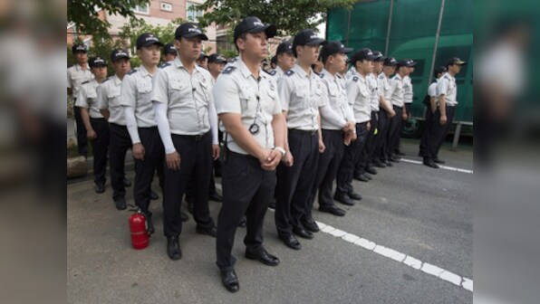 S-Korea ferry disaster: 6,000 cops storm church in search of owner