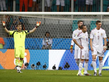 Battered Spain fight for survival in crunch match against Chile Battered Spain fight for survival in crunch match against Chile