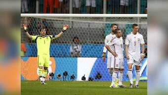 Battered Spain fight for survival in crunch match against Chile