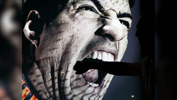 Adidas to halt Suarez adverts in World Cup after his biting antics
