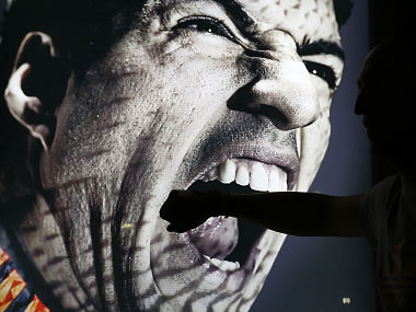Adidas to halt Suarez adverts in World Cup after his biting antics Adidas to halt Suarez adverts in World Cup after his biting antics