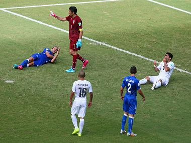 FIFA World Cup: After Suarez bite, #Suarezing is born on Twitter FIFA World Cup: After Suarez bite, #Suarezing is born on Twitter