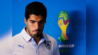 Uruguay backs under-fire Luis Suarez as FIFA scrambles 
