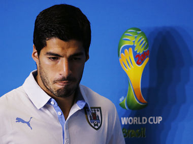 Uruguay backs under-fire Luis Suarez as FIFA scrambles Uruguay backs under-fire Luis Suarez as FIFA scrambles
