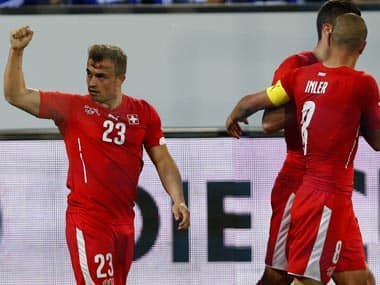 Switzerland's Xherdan Shaqiri (L) and his team mates celebrate after he scored during their international friendly soccer match against Peru in Luzern June 3, 2014. Reuters