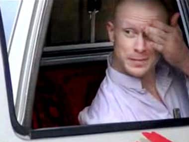 In this image taken from video obtained from Voice Of Jihad Website, which has been authenticated based on its contents and other AP reporting, Sgt. Bowe Bergdahl, sits in a vehicle guarded by the Taliban in eastern Afghanistan. AP 