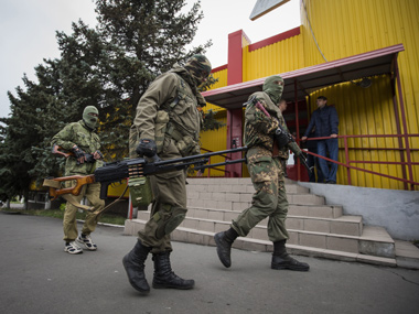 Pro-Russian rebels cheer as tanks roll into eastern Ukraine Pro-Russian rebels cheer as tanks roll into eastern Ukraine