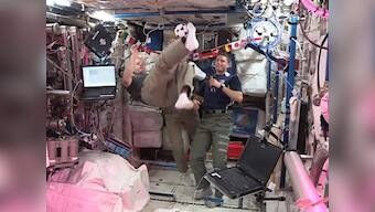 Astronauts show gravity defying tricks, will watch World Cup in space