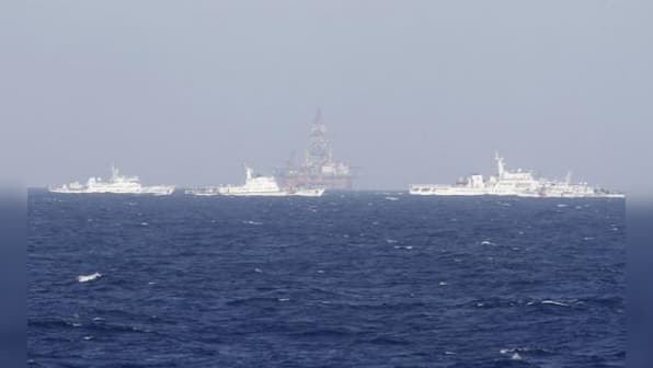 China says will never send military to oil rig spat with Vietnam