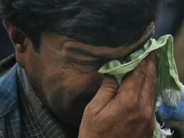 Bonath Shekar Naik wails for his son Rambabu. AP