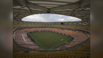 Grounds crew uses green dye to maintain stadium for England-Italy game