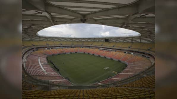 Grounds crew uses green dye to maintain stadium for England-Italy game
