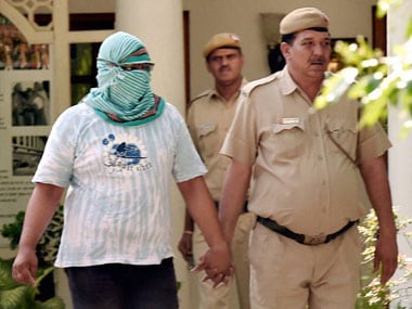 Gurvinder Singh (left) was the driver of the Indica that hit Munde's SX-4 car.