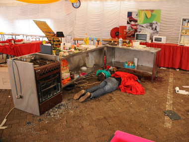 Shebab militants gun down at least 34 in Kenya's coastal town Shebab militants gun down at least 34 in Kenya's coastal town