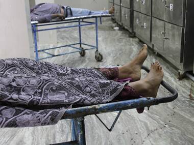 Parking-centred hospitals: How vehicles affect health care access