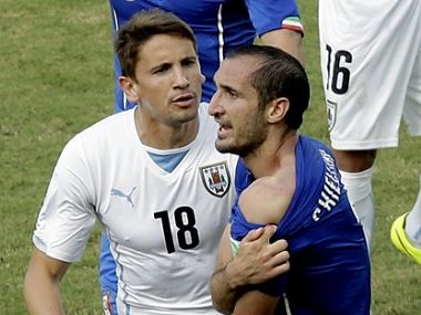 World Cup 2014: Game with bite, Suarez could be in trouble again World Cup 2014: Game with bite, Suarez could be in trouble again