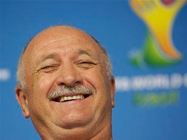Brazil's coach Luiz Felipe Scolari laughs during a press conference ahead of the first game. AP