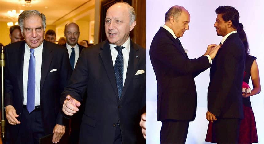 (L) Laurent Fabius, Minister of Foreign Affairs and International Development of France with Chairman Emeritus of Tata Sons Ratan Tata during a special ceremony to invite him to receive HEC Paris Honorary Degree, at Taj Mahal Palace Hotel in Mumbai on Tuesday. (R) Bollywood superstar Shah Rukh Khan being conferred with Chevalier de la Legion d'Honneur, the highest Honour in France by Laurent Fabius, Minister for Foreign Affairs and International Development of France in Mumbai on Tuesday. PTI