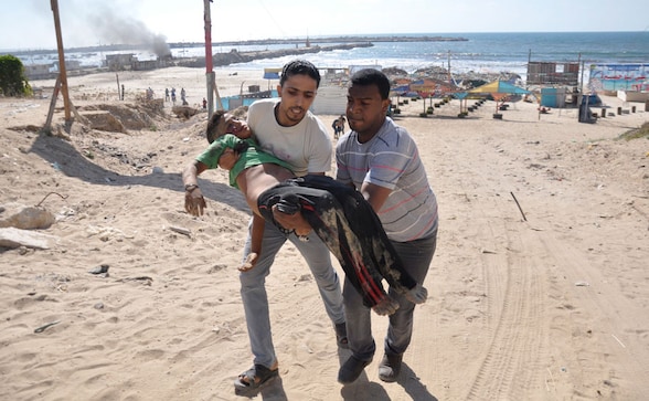 Photos: Israeli strikes leave four children dead on Gaza beach-World ...