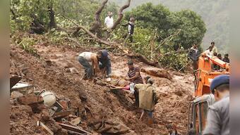 Photos: Landslide near Pune buries village, killing 25
