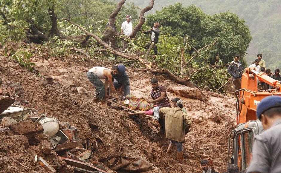 Photos: Landslide near Pune buries village, killing 25 Photos: Landslide near Pune buries village, killing 25