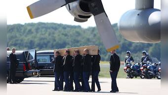 Photos: Heartbroken Netherlands receives bodies of MH17 victims