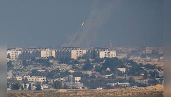 Photos: 200 dead in Israeli air raids as Gaza conflict deepens 