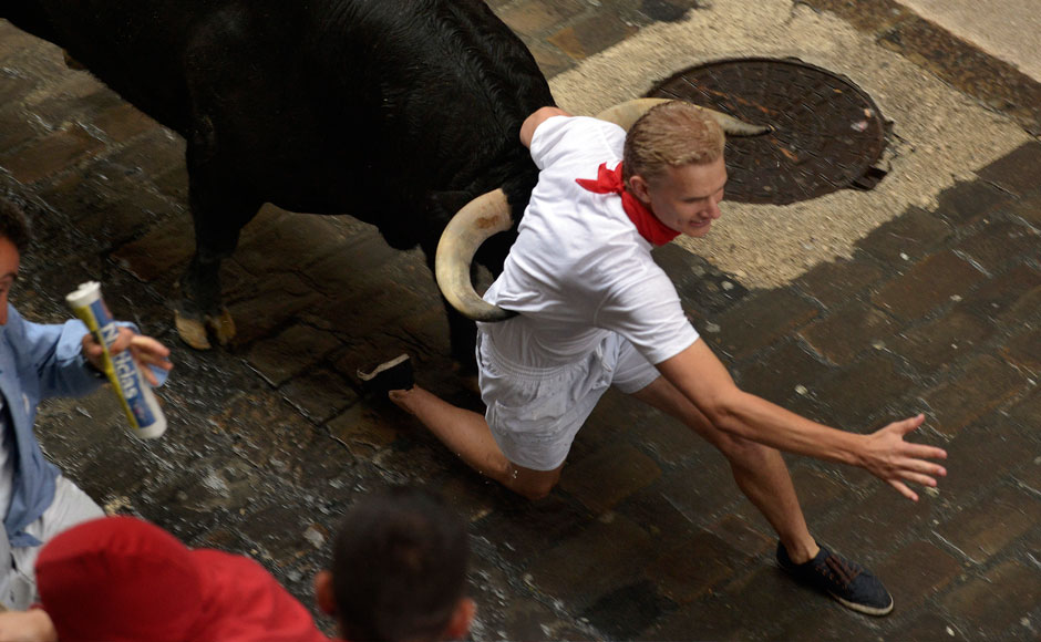 Photos: The annual San Fermin bull-running festival in Pamplona, Spain Photos: The annual San Fermin bull-running festival in Pamplona, Spain