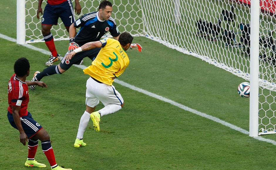 In an intensely fought match, Brazil edged Colombia 2-1 to enter the semi-final of World Cup 2014. Brazil's skipper Thiago Silva opened the scoring in as early as the 7th minute as he bundled home from close range. Reuters