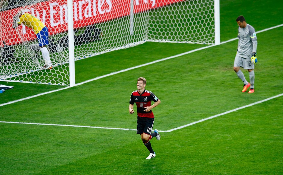 Germany's Toni Kroos celebrates scoring his team's fourth goal against Brazil during their 2014 World Cup semi-finals at the Mineirao stadium in Belo Horizonte July 8, 2014. REUTERS
