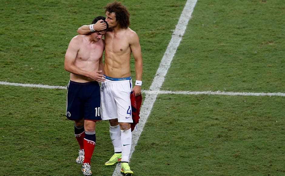 One of the most heartening moments came after the final whistle when Brazil's David Luiz (R) consoled Colombia's star James Rodriguez. Reuters 