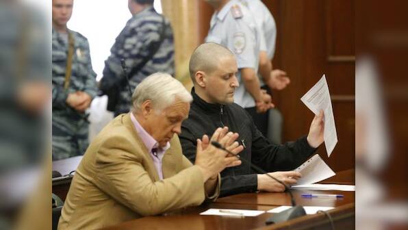 Russian court jails Putin foes on charges of inciting mass riots