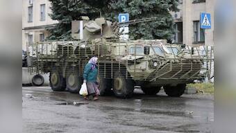 Pushed from Slaviansk, Ukraine rebels barricade Donetsk