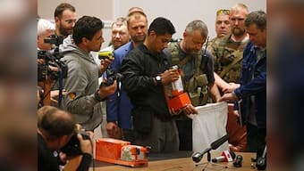 Live: MH17 bodies arrive in Netherlands