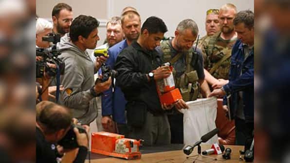 Live: MH17 bodies arrive in Netherlands
