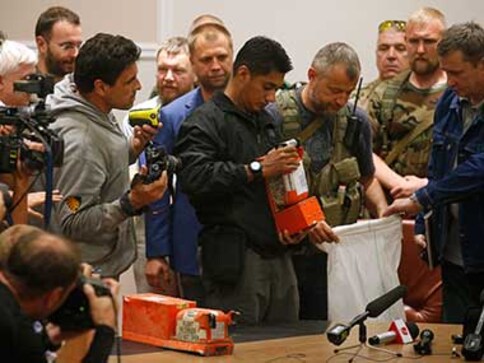 Live: MH17 bodies arrive in Netherlands Live: MH17 bodies arrive in Netherlands