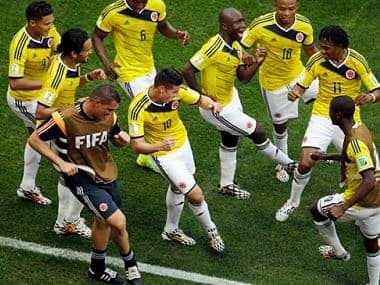 File photo of Colombia's James Rodriguez, center, dances with teammates in celebration after scoring during the current World Cup. AP