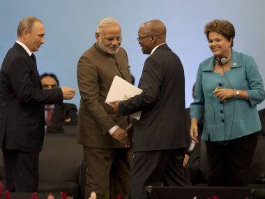 Russia’s President Vladimir Putin, left, India’s Prime Minister Narendra Modi, second left, and Brazil’s President Dilma Rousseff, right, greet South African President Jacob Zuma. AP