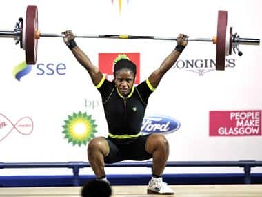 Nigeria's gold medalist Chika Amalaha competing in the women's weightlifting 53kg class, at the SECC Precinct during the 2014 Commonwealth Games. AFP 