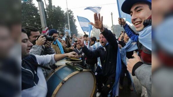 Argentina's gutsy World Cup team welcomed home by thousands of fans