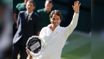 Down but not out: Roger Federer vows to return to Wimbledon