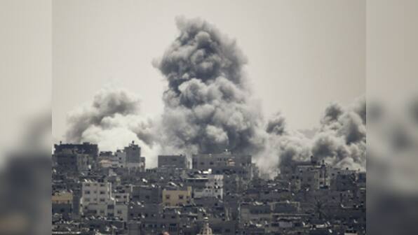 After burning for 24-days, Gaza falls silent as 3-day ceasefire takes effect