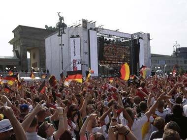 German fans thronged the streets to welcome their team home. AP