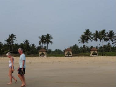 Tourists are seen on Goa’s Candolim beach. AFP