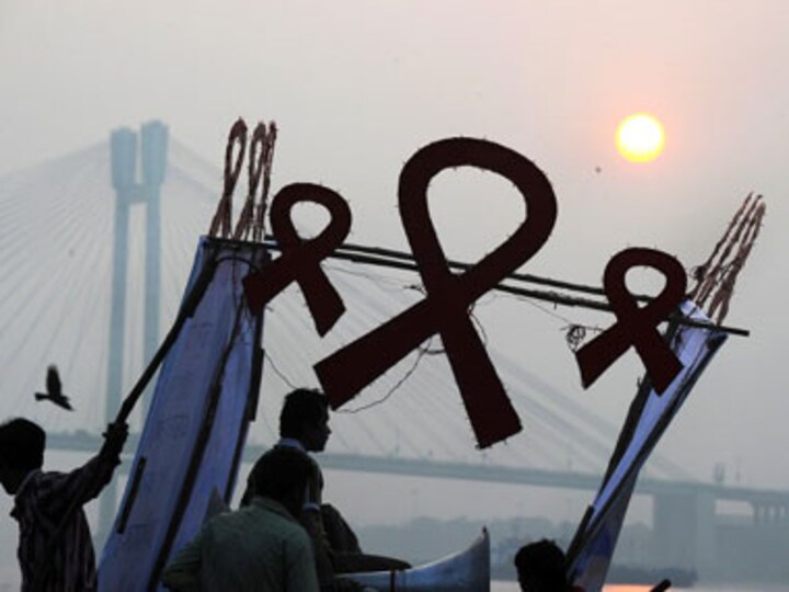 Male circumcision reduces women's risk of contracting HIV virus: study